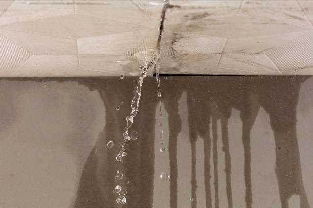 Professional Sewage Cleanup technician working in Woodlake, CA